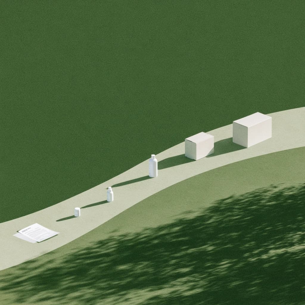 boxes climbing a path over a green hill